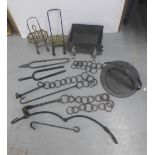 Quantity of iron skillets and hooks, tongs, trivets, etc (a lot)