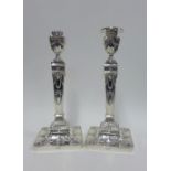 Pair of silver candlesticks, Barker Ellis Silver Co, Birmingham 1965, with repousee classical