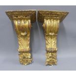 A pair of giltwood acanthus and floral wall shelf brackets (2) 34cm