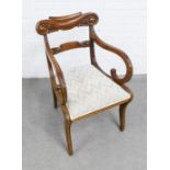 George IV mahogany open armchair, volute carved top rail and mid rail, upholstered seat and sabre