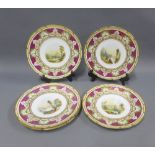 Set of five porcelain plates with loch and landscape scenes within puce borders, number 9338,