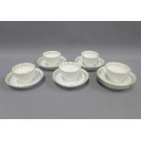 Twelve Barr Worcester fluted tea bowls and saucers, white glazed with gilt rims and borders, (12)