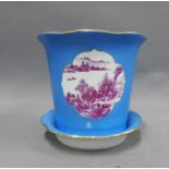 Chinese blue glazed cache pot and stand, with a pagoda and landscape panel in puce, 13cm