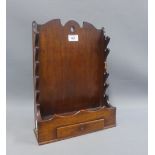 Mahogany wall shelf with scalloped sides and a drawer to the base, 39cm