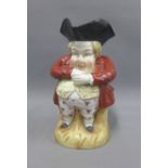 Toby jug, typically modelled standing, with a D mark to the base, 26cm high