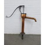 Antique copper water pump with black iron mounts with a heart shaped handle, 108 x 104cm