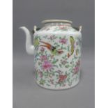 Chinese famille rose wine pot typically painted with flowers and insects, 17cm