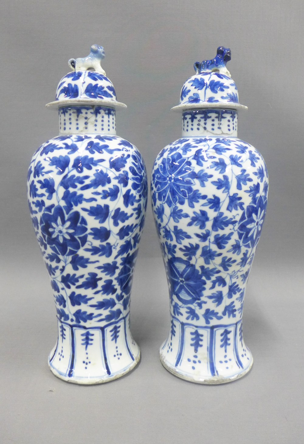 Pair of Chinese blue and white high shouldered baluster vases, covers with dog finials, painted - Image 2 of 4