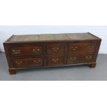 Antique oak Welsh style linen press base, the sides with floral inlaid pattern, with an