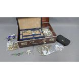 Brown leather case containing a collection of vintage and later costume jewellery, silver