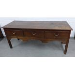 Oak dresser base with three drawers and shaped apron, on square legs 76 x 75 x 62cm