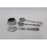 Victorian Sheffield silver handled fork, and a Queens pattern white metal tongs and a Victorian
