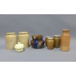 Collection of stemware jar and bottle and a blue and brown glazed tobacco jar and a small cream ware