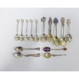 A collection of silver and some white metal souvenir spoons together with an Epns anointing spoon,