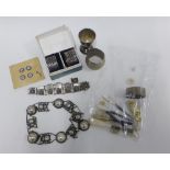 Mixed lot to include silver and white metal napkin rings, mother of pearl handled files, enamel