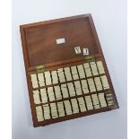 19th century Miller's Fancy Toy Repository mahogany box containing a large collection of ivory