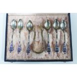 Marius Hammer, Norwegian set of six silver and enamel teaspoons with matching sugar tongs, in a