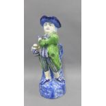Hearty Good Fellow Toby jug, modelled standing and wearing a green jacket and blue striped breeches,