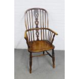 Elm Windsor chair with pierced splat, saddle seat, turned legs and H stretcher, 58 x 109cm