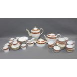 English porcelain tea and coffee set comprising coffee pot, teapot and stand, sucrier, slop bowl,