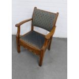 Early 20th century oak armchair with lift up seat containing storage, vintage style blue upholstery,