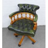 Reproduction green leather swivel captain's chair 62 x 86 x 51cm.