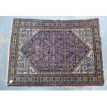 Eastern rug, blue field and ivory spandrels with allover floral pattern, 148 x 108cm