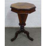 19th century walnut sewing table, octagonal lift up top and column, on tripod legs 43 x 71cm.