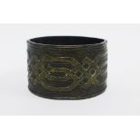 Bronze bracelet with geometric knot pattern