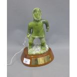 Canada Eskimo Art carved green hardstone model of a Hunter, on a wooden base, height excluding