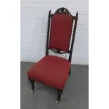 Mahogany chair with leaf carved top rail and barley twist uprights with red upholstered back and