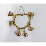 9ct gold belcher link charm bracelet hung with five 9ct gold seal fobs to include smoky quartz and