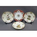 Set of three 19th century porcelain cabinet plates, each with a handpainted bird pattern to