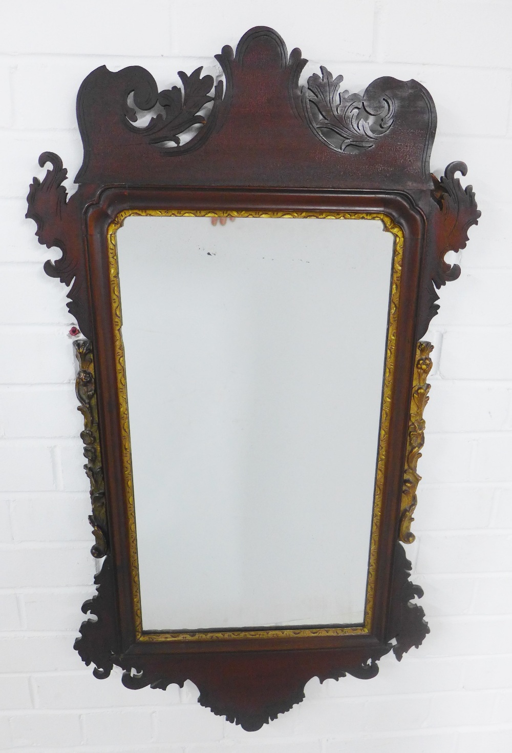 Georgian style mahogany and parcel gilt wall mirror 96 x 52cm.