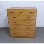Vintage light oak chest with five short and two long drawers of drawers, 91 x 107 x 52cm.