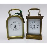 Elliot brass cased carriage timepiece and another with plain arched case, tallest 12cm, including