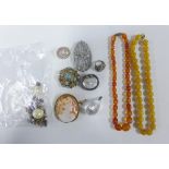 Collection of costume jewellery, amber coloured beads, Cameo brooch in a yellow metal frame, various