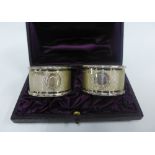 A pair of Victorian silver napkin rings, James Dixon & Sons, Sheffield 1896, with vacant shield