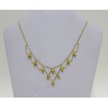Gold necklace with burnished and polished drops, stamped 9k, approx 9g