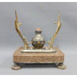 Scottish desk inkwell with a central white metal inkwell with a pink hardstone finial, flanked by