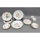 Collection of handpainted Dresden floral pattern porcelain to include two cake plates, muffin dish