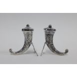 Norwegian Sterling silver salt and pepper pots, each of cornucopia shape with engraved celtic