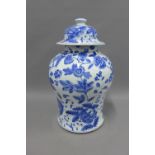 Large blue and white pottery chinoiserie jar and cover,