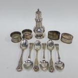 George V silver sugar castor, Edinburgh 1936, 14cm high, four miscellaneous silver napkin rings