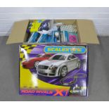 Scaletrix Road Rivals with Porsche Boxters V's Audi Coupe, boxed together with other boxed cars, (
