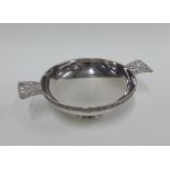 Silver quaich with pierced handles and plain circular footrim, Birmingham 1991, 17.5cm including