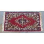 Eastern red wool rug, 134 x 70cm