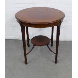 Mahogany two tier table, circular top with moulded edge, on tapering legs, 69 x 72cm