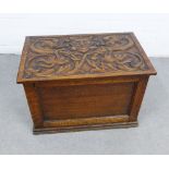 Late 19th / early 20th century oak box, the hinged lid with carved lions head pattern, 57 x 38 x