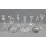 Collection of eight various glass decanters and stoppers to include a ships decanter, etc (8)